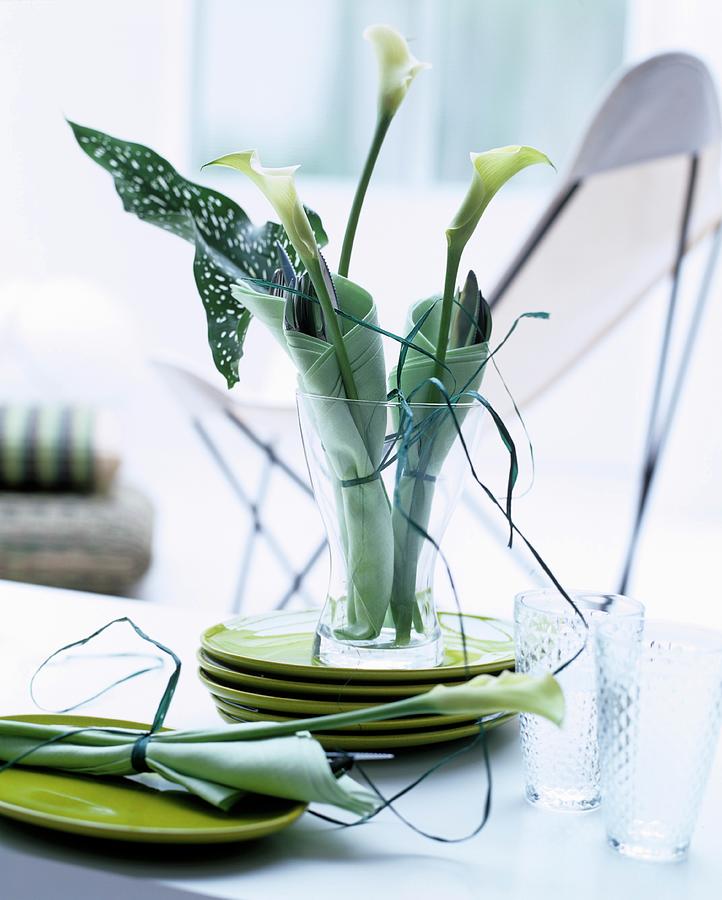 Table Centrepiece In Shades Of Green With Calla Lilies Wrapped In Napkins Photograph by Matteo Manduzio