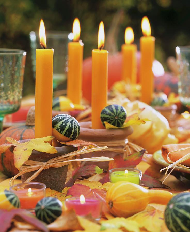 Table Decorated For Autumn With Candles And Gourds Photograph by Strauss, Friedrich