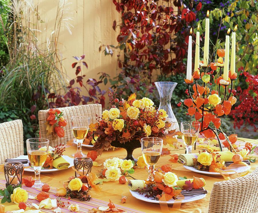 Table Decoration Of Physalis chinese Lanterns & Yellow Roses Photograph by Strauss, Friedrich
