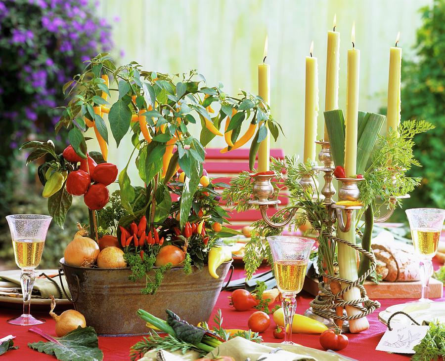 Table Decoration With Candles And Vegetables Photograph by Strauss, Friedrich