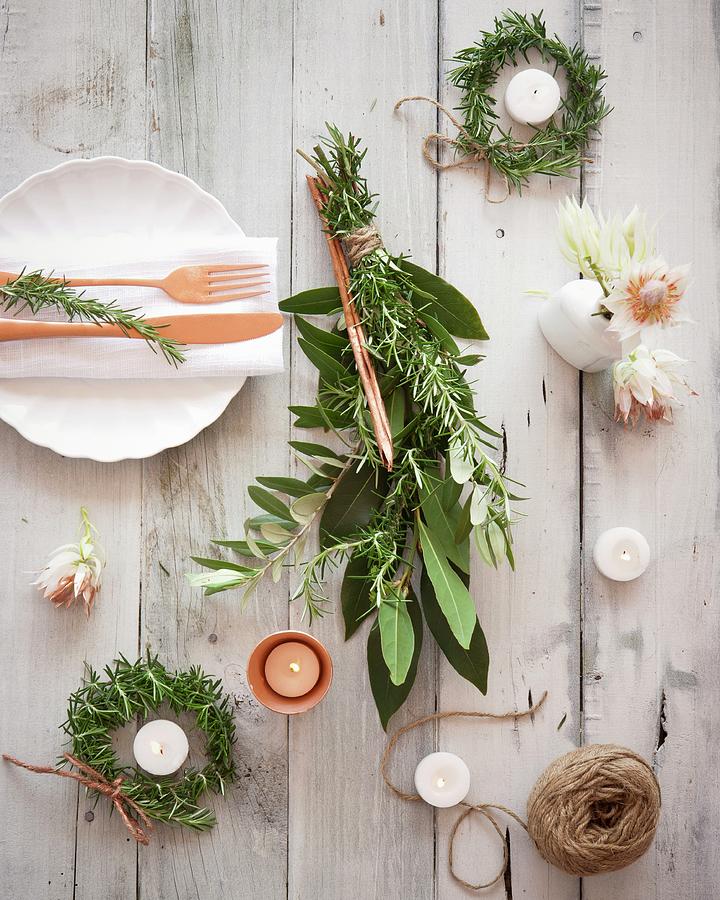 Table Decoration With Rosemary And Candles Photograph by Great Stock!