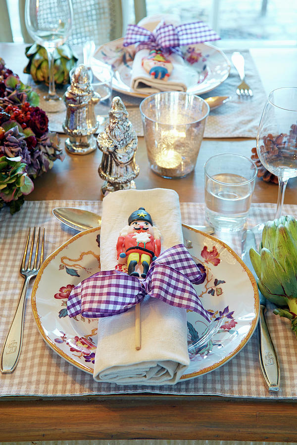 Table Festively Set With Nutcracker Lollipops On Plates Photograph by Sven C. Raben