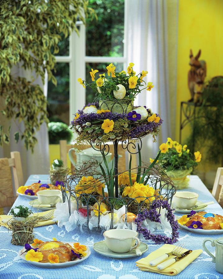 Table Laid For Easter With Flowers On Tiered Stand & Bread Ring Photograph by Strauss, Friedrich