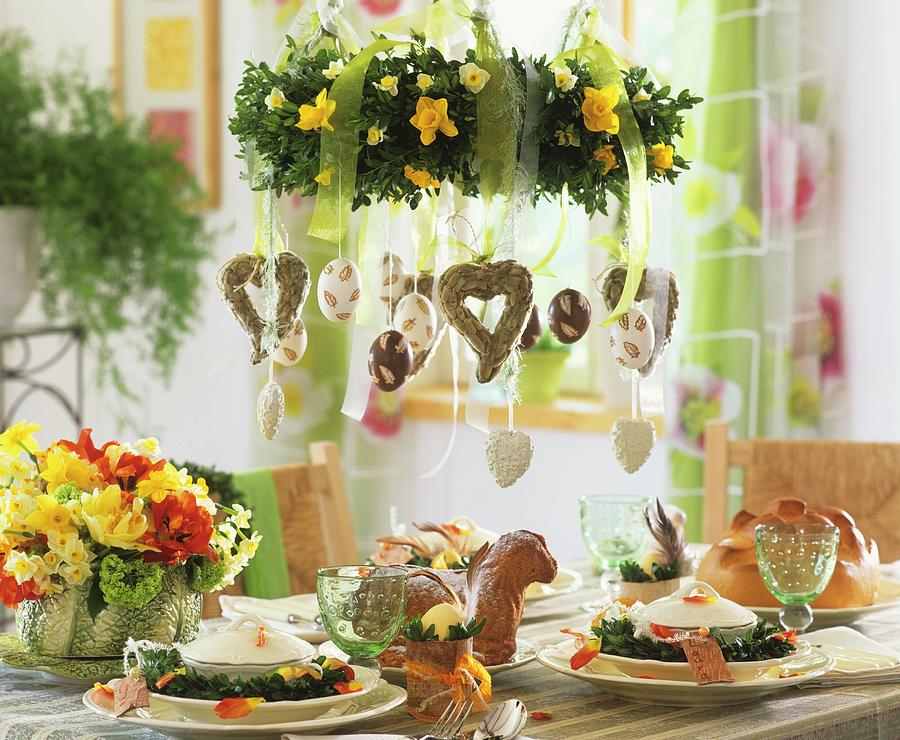 Table Laid For Easter With Soup Bowls; Hanging Wreath Photograph by Strauss, Friedrich