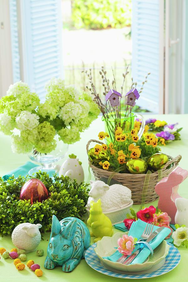 Table Set For Easter With Spring Flowers, China Rabbits And Easter Place Setting Photograph by Studio Lipov