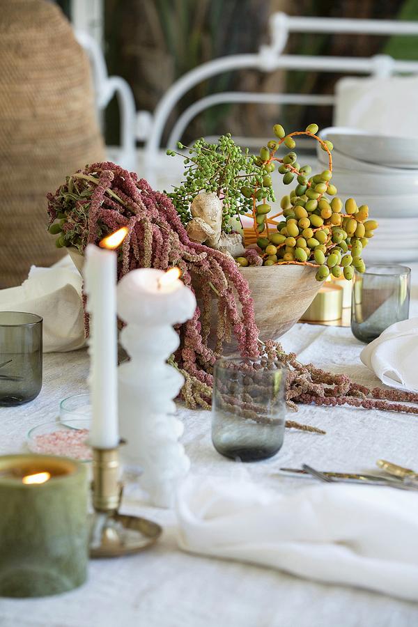 Table Set With Arrangement Of Plants And Candles Photograph by Great Stock!