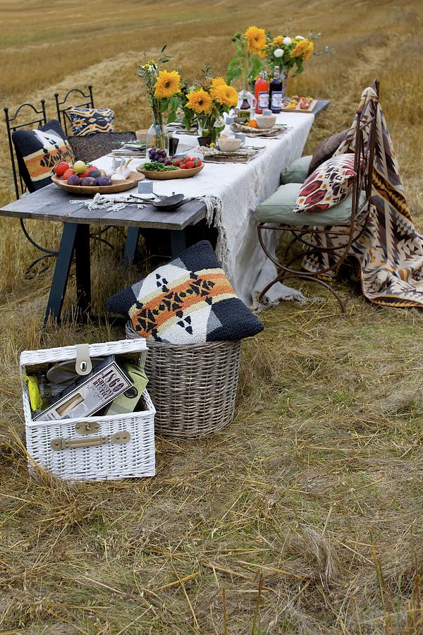 Table Set With Sunflowers And White Linen Tablecloth In Stubbly Field Photograph by Annette Nordstrom