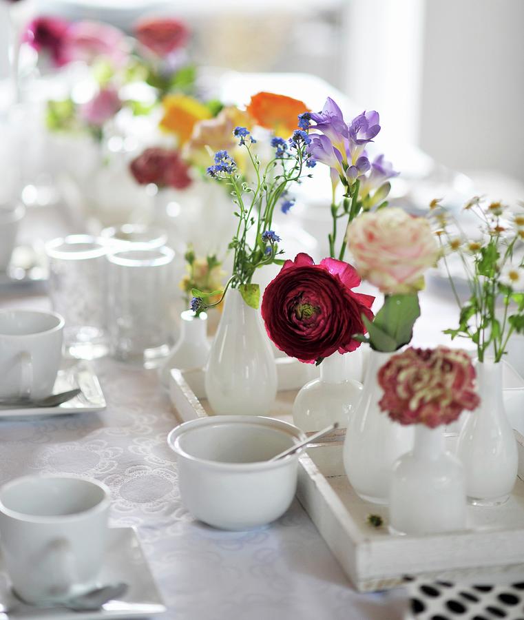 Table Set With White Crockery And Spring Flowers Photograph by Alexandra Feitsch