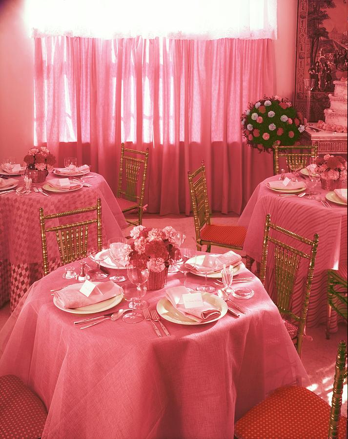 Table Setting On Pink Tablecloths Photograph by Horst P. Horst