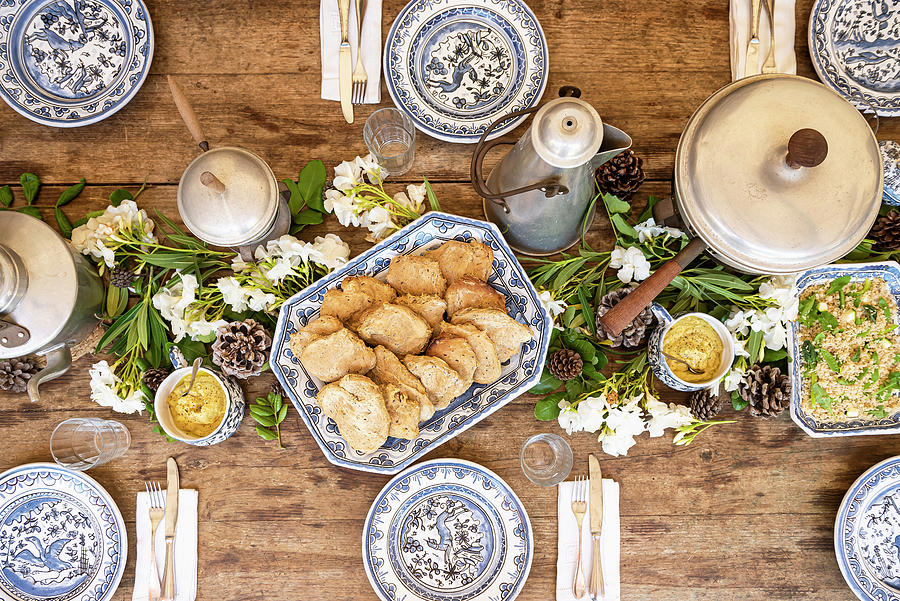Table Spread And Setting With Blue Crockery And Rustic Props And Homemade Bread In The Center Photograph by Giulia Verdinelli Photography