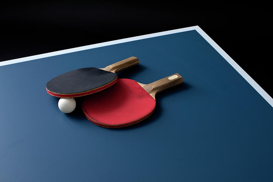 Table Tennis Bats And A Ball On A Table Photograph by Benne Ochs