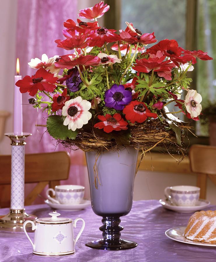 Table With Anemone Coronaria, Cups And Mini-gugelhupf Photograph by Friedrich Strauss
