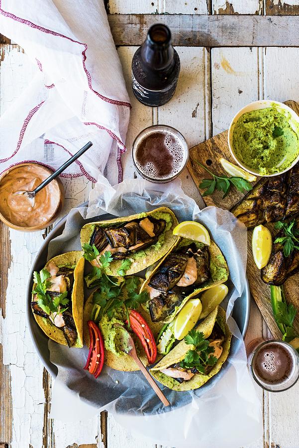 Taco Shells With Fried Aubergines And Houmous Photograph by Hein Van Tonder