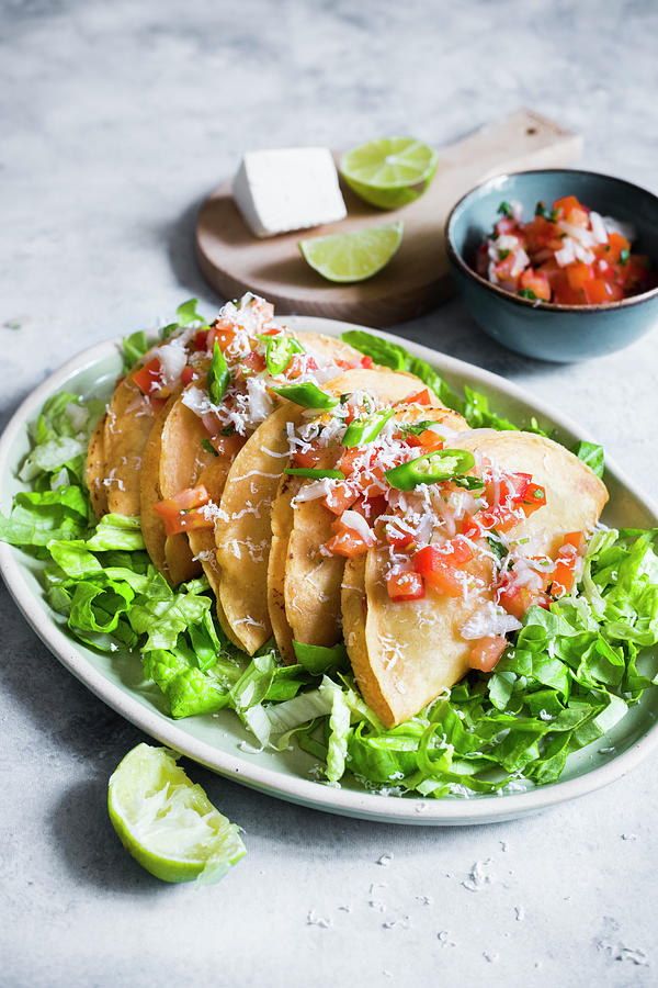Tacos De Papa with Potato Filling On Salad With Tomato Salsa Photograph by Maricruz Avalos Flores