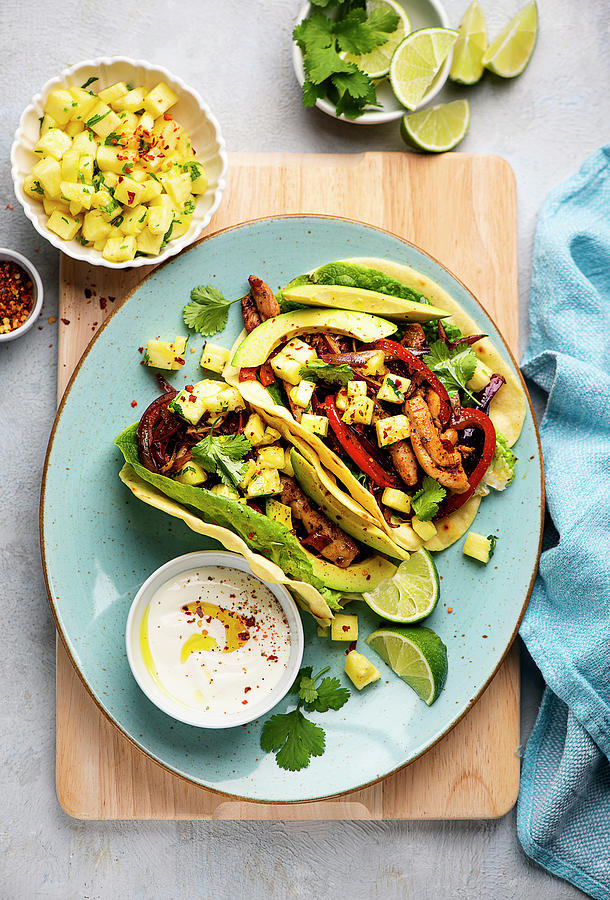 Tacos Filled With Chicken, Avocado And Pineapple Photograph by Ewgenija Schall