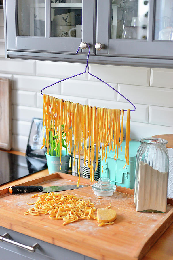 Tagliatelle Pasta, Drying Pasta, Drying Pasta On A Hanger Photograph by Karolina Smyk