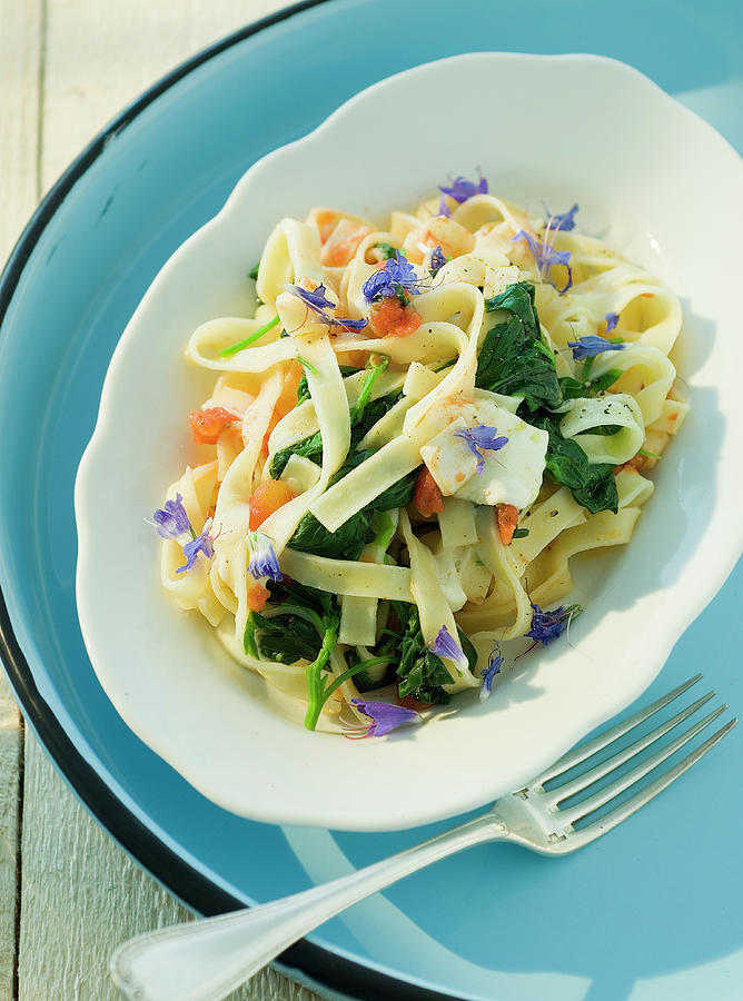 Tagliatelle With Atriplex And Edible Flowers Photograph by Andreas Thumm