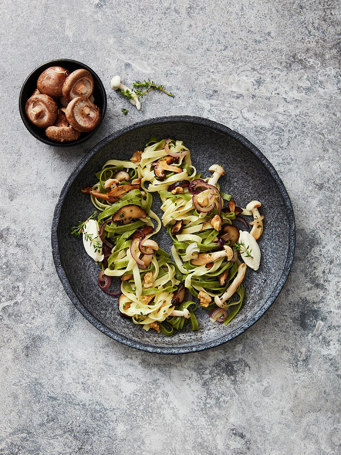 Tagliatelle With Button Mushrooms, Enoki Mushrooms, Crme Frache And Thyme Photograph by Thorsten Kleine Holthaus
