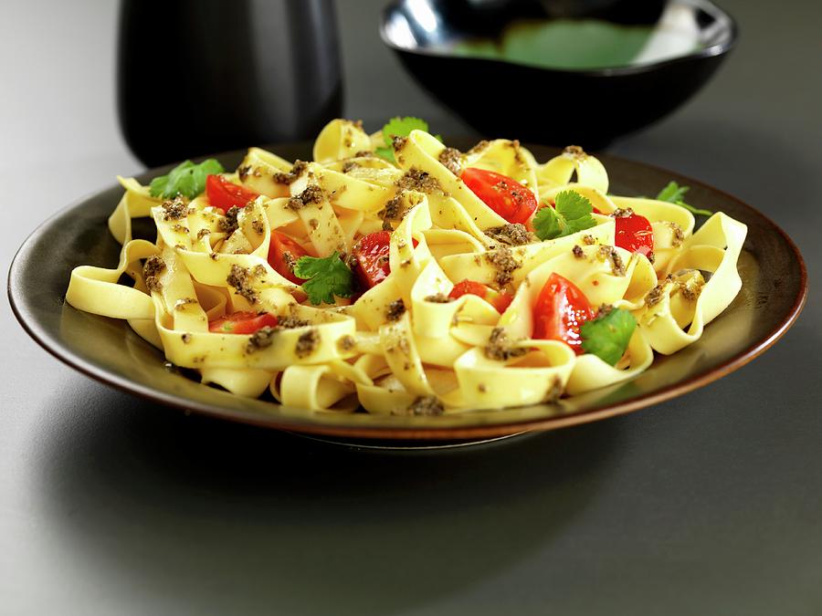 Tagliatelle With Coriander And Chili Pasta Sauce And Tomatoes Photograph by Robert Morris