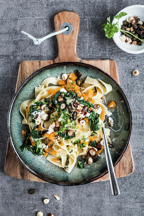 Tagliatelle With Pumpkin, Spinach And Goats Cheese Photograph by Simone Neufing