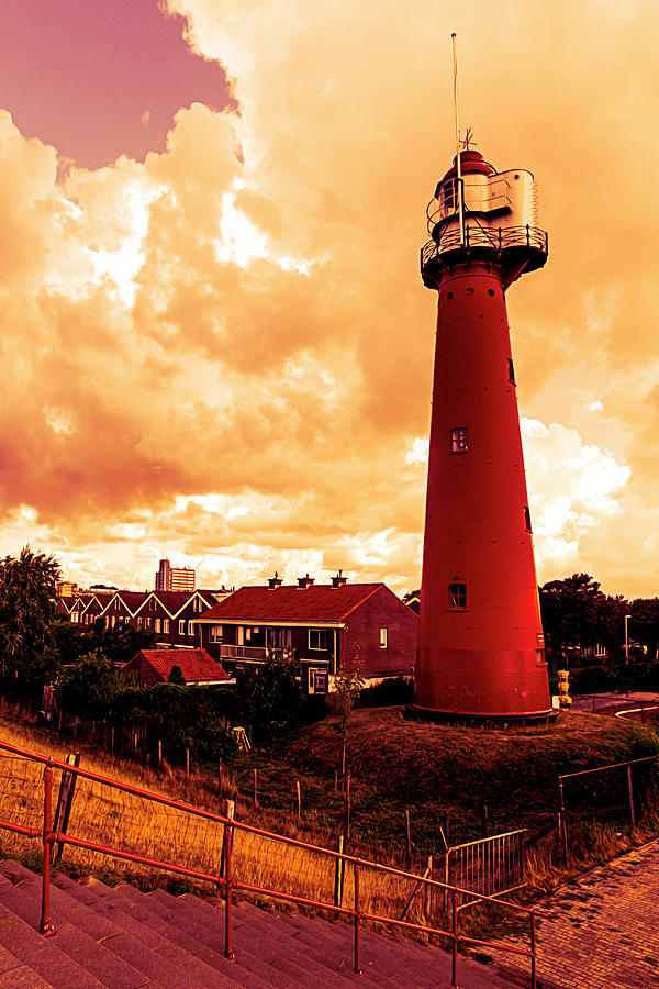 Tall Bright Red Lighthouse in Holland Photograph by Debra and Dave Vanderlaan