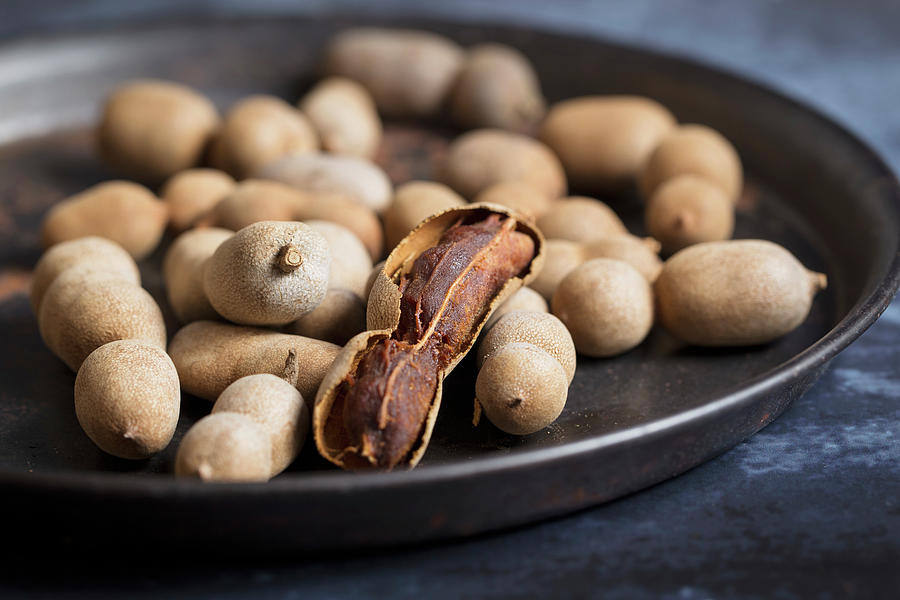 Tamarind Husks, One Opened Photograph by Nicole Godt - Fine Art America