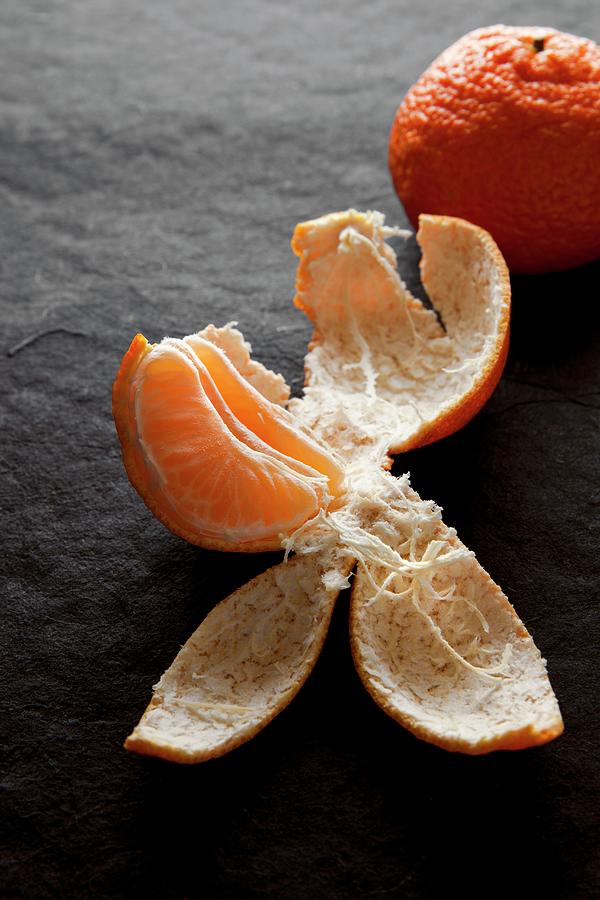 Tangerine Wedge In The Peel Photograph by Lscher, Sabine