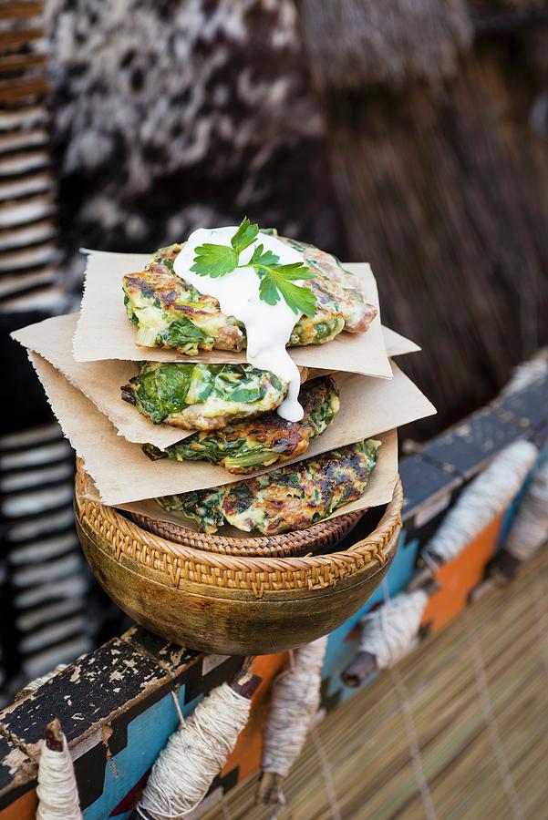 Taro Cakes With Beans And Imbuya african Leafy Vegetables Served With Yoghurt Sauce Photograph by Great Stock!