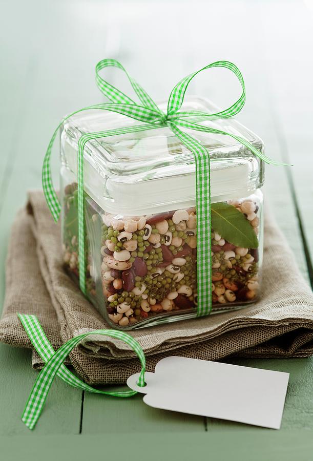 Tarragon Bean Soup Mix In A Glass Storage Container Photograph by Firmston, Victoria