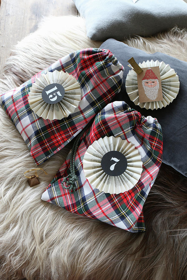 Tartan Sachets With Numbered Paper Rosettes Photograph by Regina Hippel
