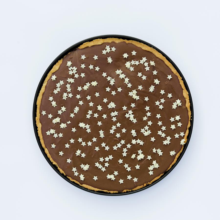 Tarte Au Chocolat Decorated With Small White Stars seen From Above Photograph by Esther Hildebrandt