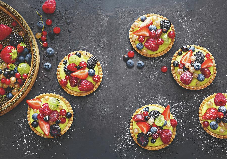 Tartlets With Pistachio And Rosemary Cream And Marinated Summer Berries Photograph by Jalag / Mathias Neubauer