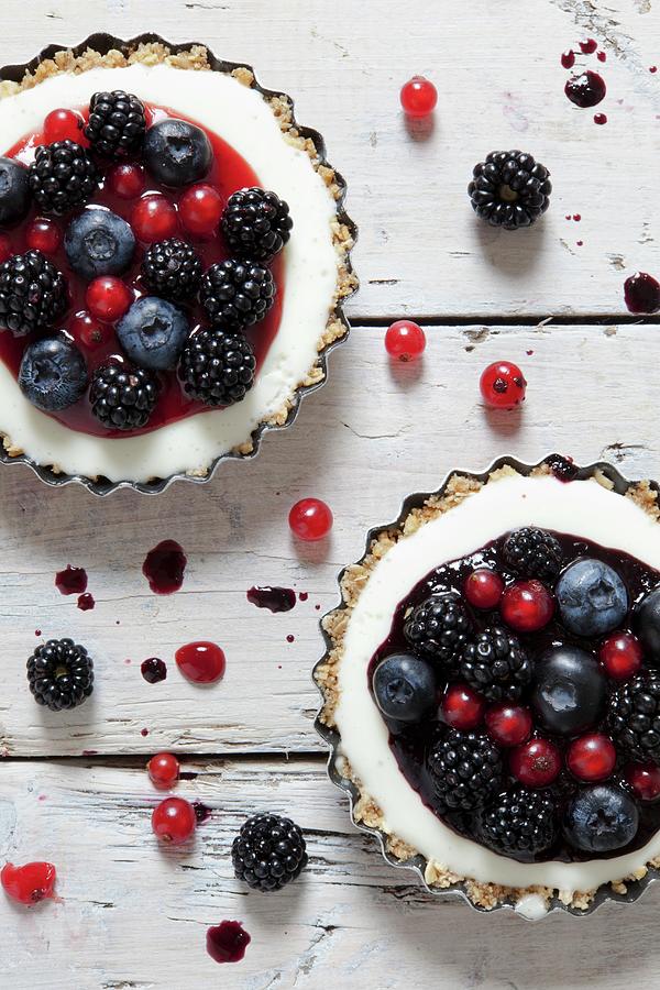 Tartlets With Yoghurt Cream, Blackberries, Blueberries And Redcurrants Photograph by Zaira Lavinia Zarotti