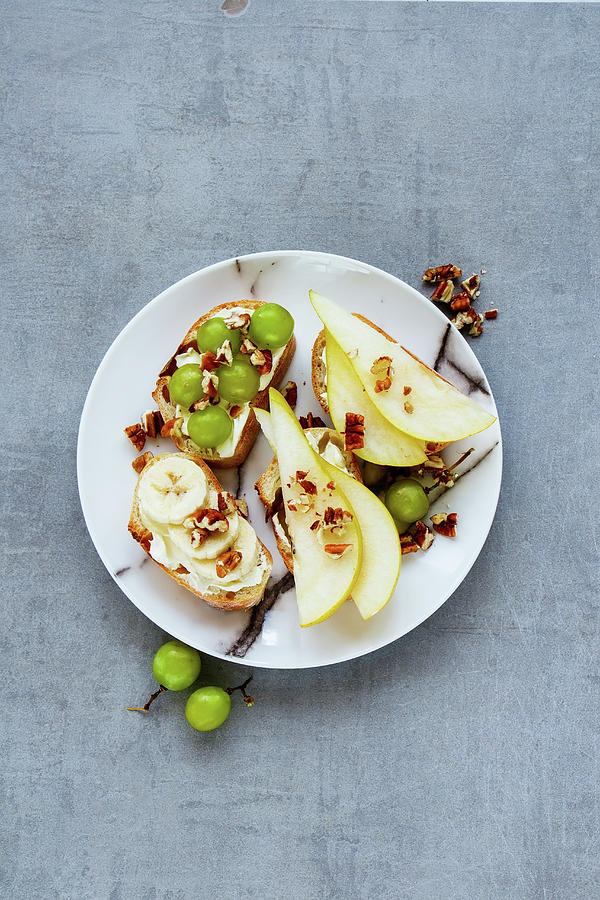 Tasty Crostini With Pear, Cream-cheese, Grapes, Banana And Nuts Photograph by Yuliya Gontar