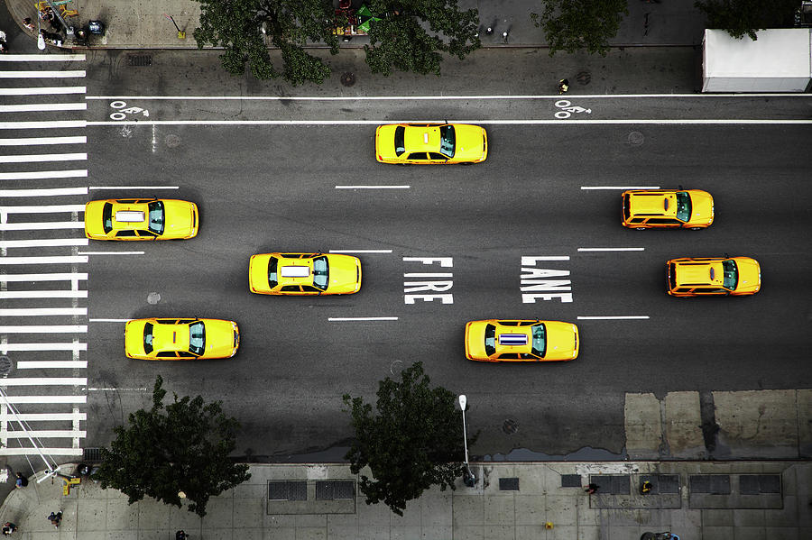 Taxi Cabs In Nyc, High Angle View Photograph by Thomas Northcut