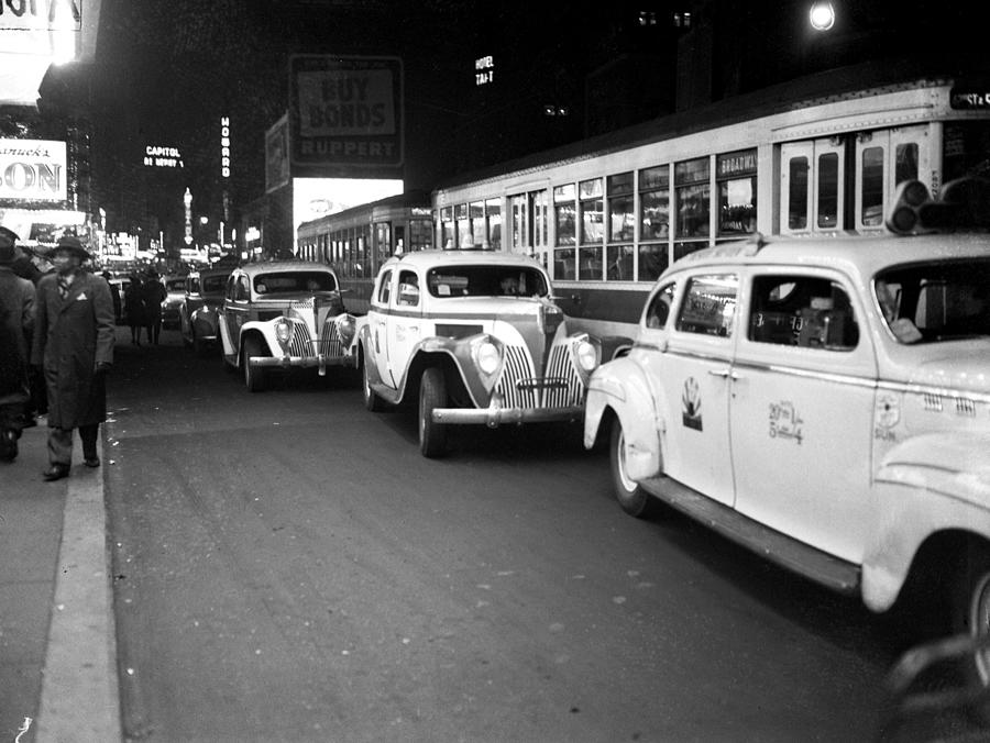Taxis Outside Times Square Theaters At Photograph by New York Daily News Archive