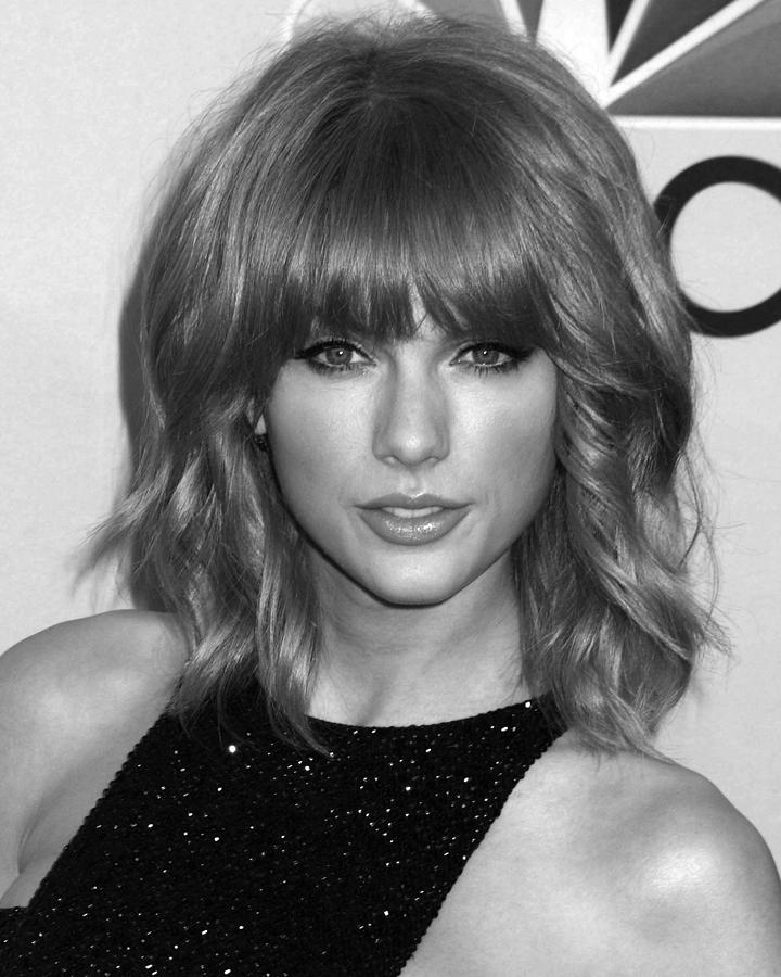 Taylor Swift Photograph - Taylor Swift At The Iheartradio Music Awards by Globe Photos