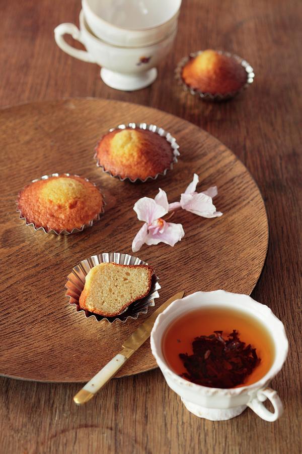 Tea And Mini Yeast Cakes Photograph by Lukasz Zandecki
