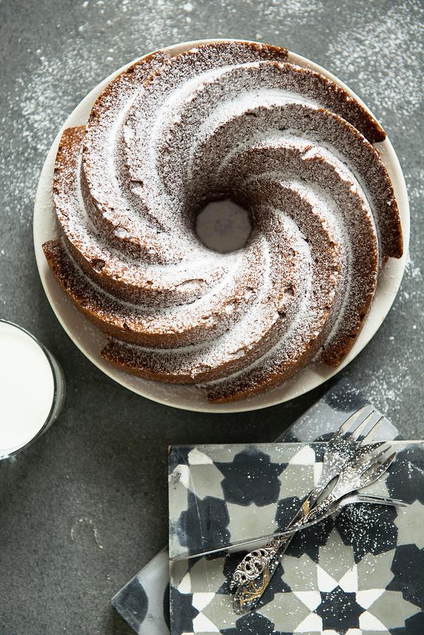 Tea Cake With Icing Sugar Photograph by Veronika Studer