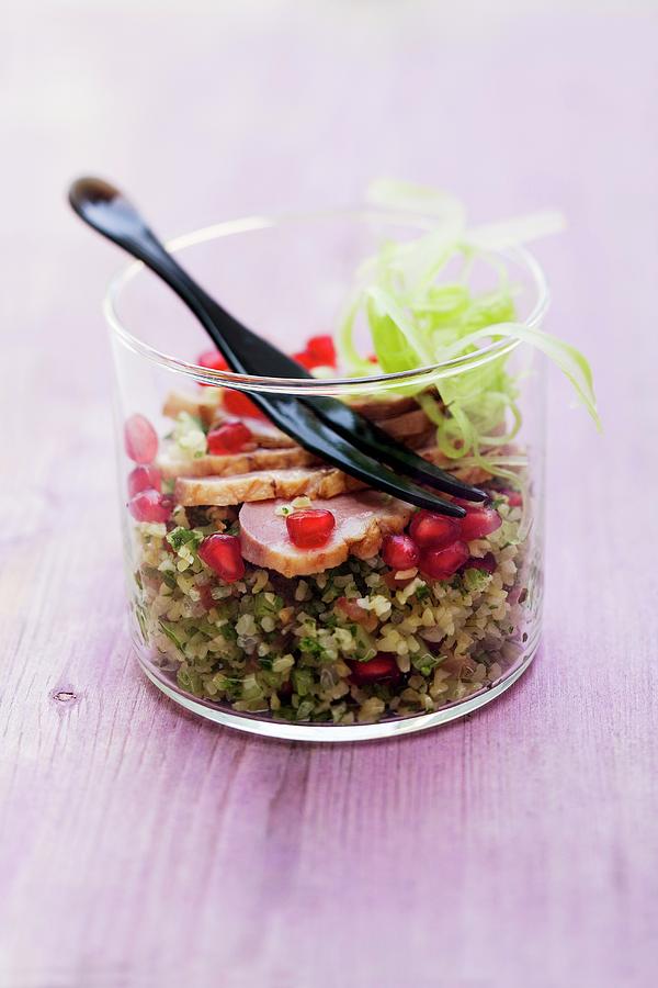Tea-smoked Duck Breast With A Celery And Pomegranate Tabbouleh In A Glass Photograph by Michael Wissing