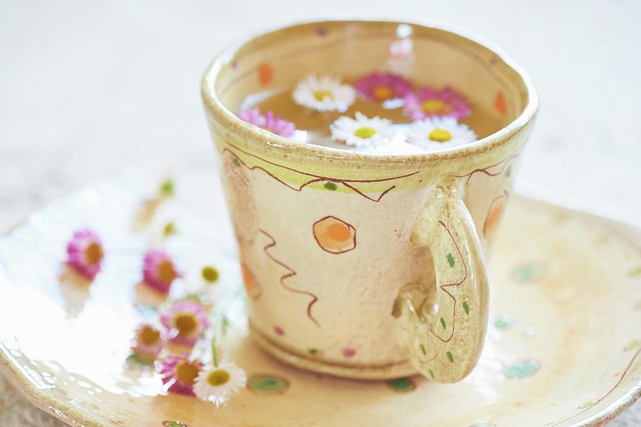 Tea With Daisies In A Ceramic Mug Photograph by Nele Braas