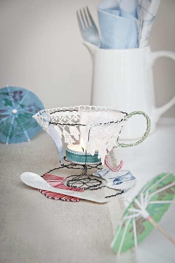 Teacup-shaped Tealight Holder Hand-made From Wire And Lace On Table Photograph by Cornelia Weber