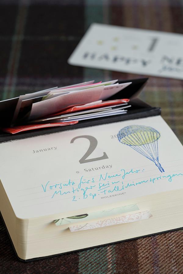 Tear-off Calendar With Handwritten Notes And Stamped Print Photograph by Alexandra Loock