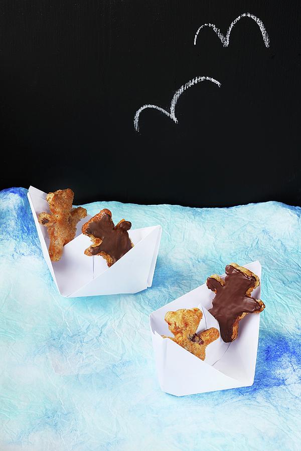 Teddy Bear Biscuits In Paper Boats Photograph by Zita Csig