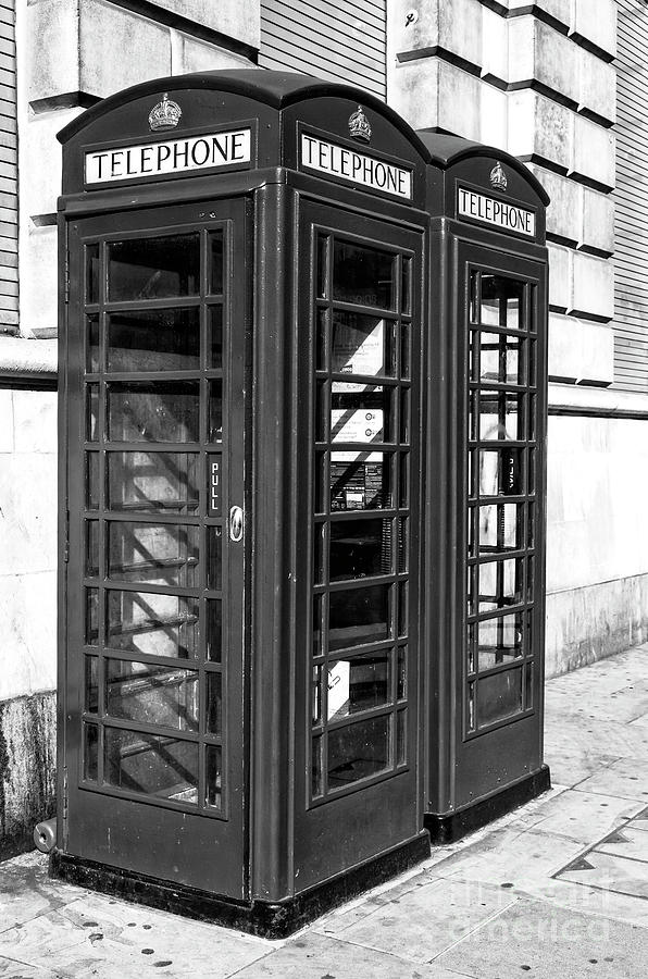 Telephone Drama in London Photograph by John Rizzuto