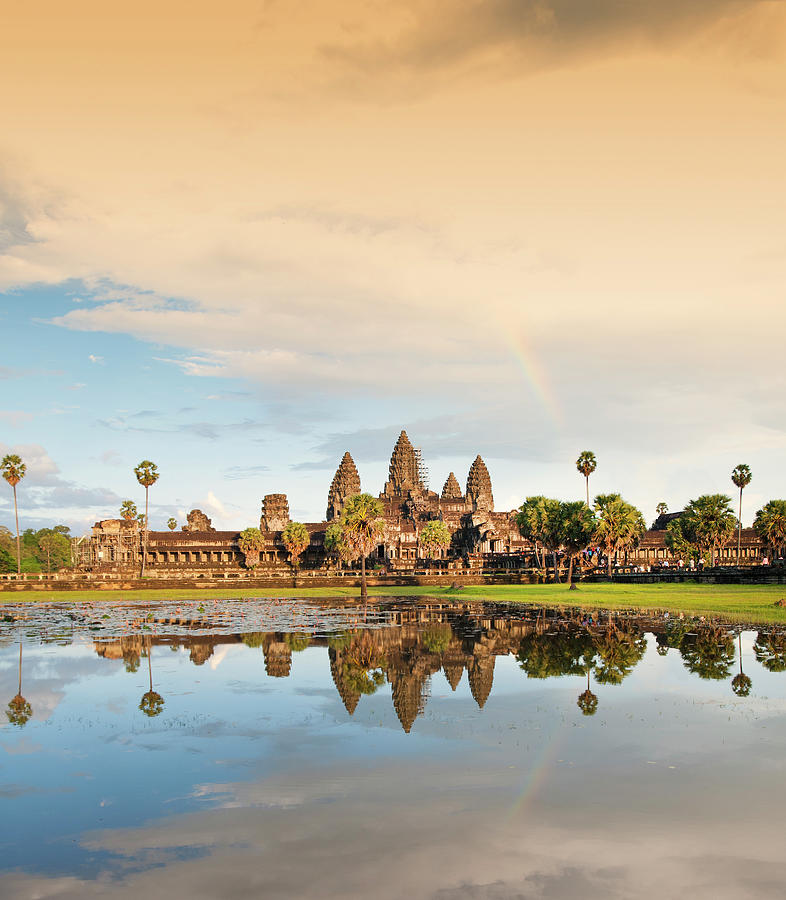 Temple Of Angkor Wat With Rainbow The Photograph by Guenterguni