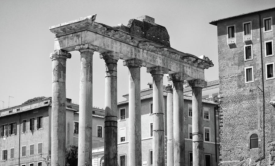 Temple of Saturn Set Against More Modern Buildings Rome Italy Black and White Photograph by Shawn OBrien