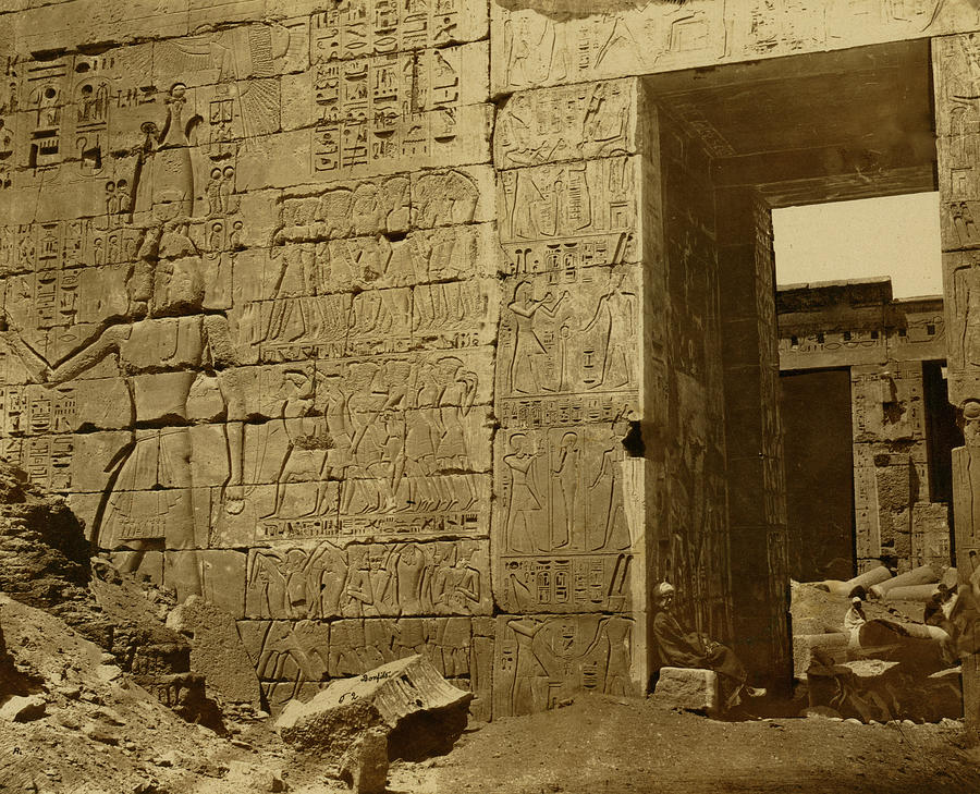 Temple wall with hieroglyphics and entrance, rubble inside and out ...