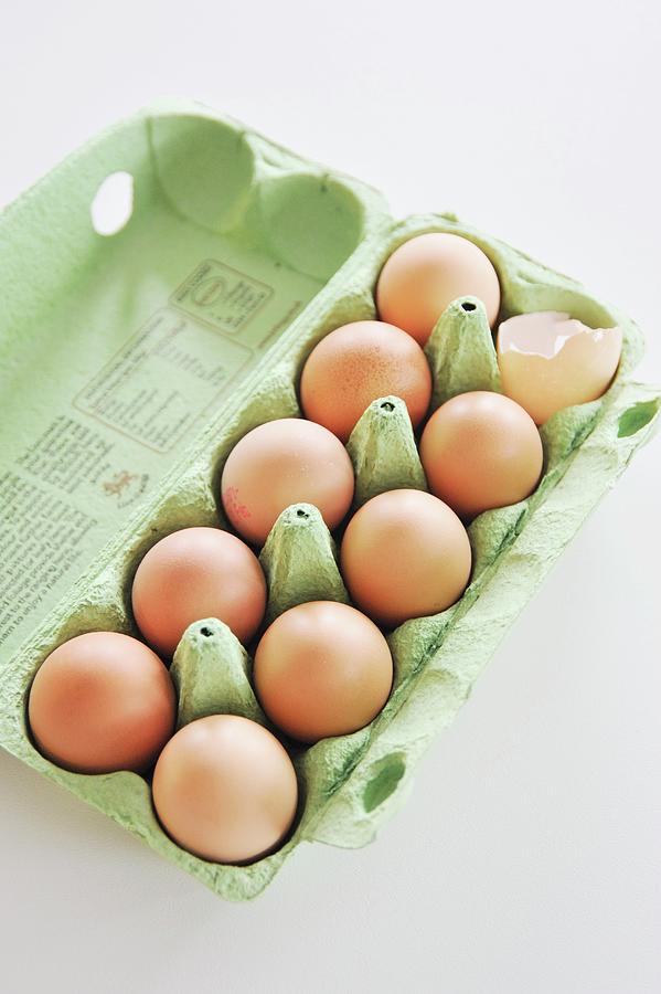 Ten Eggs In An Egg Box Photograph by Bill Kingston