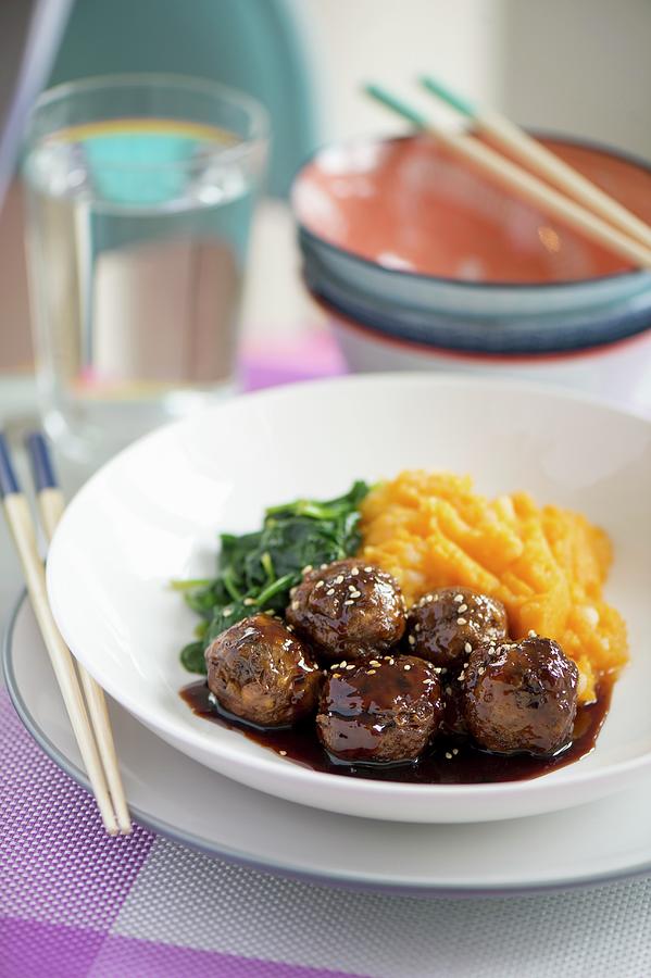 Teriyaki Chicken Meatballs With Mashed Sweet Potato And Baby Spinach japan Photograph by Winfried Heinze